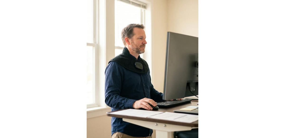 Unknot Neck & Shoulder Wrap at a standing desk