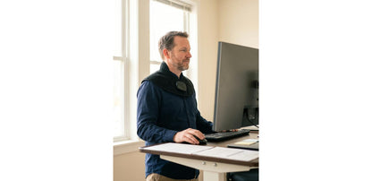 Unknot Neck & Shoulder Wrap at a standing desk