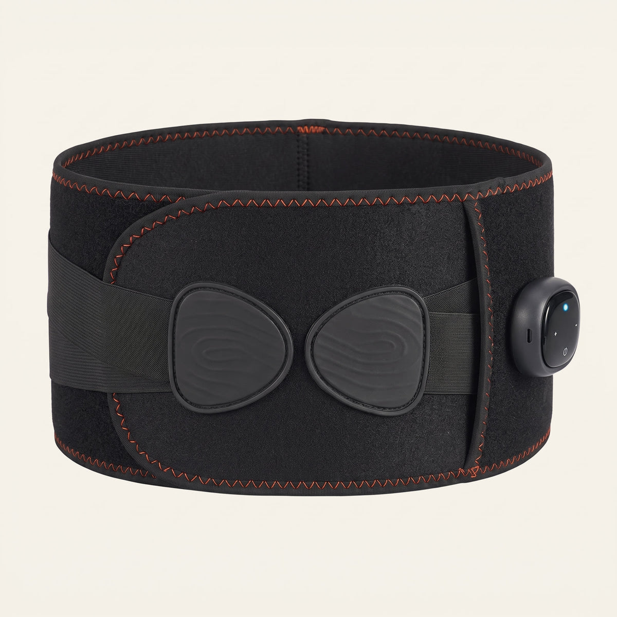 Unknot Heat Belt, front view, with the two pads and the side dial